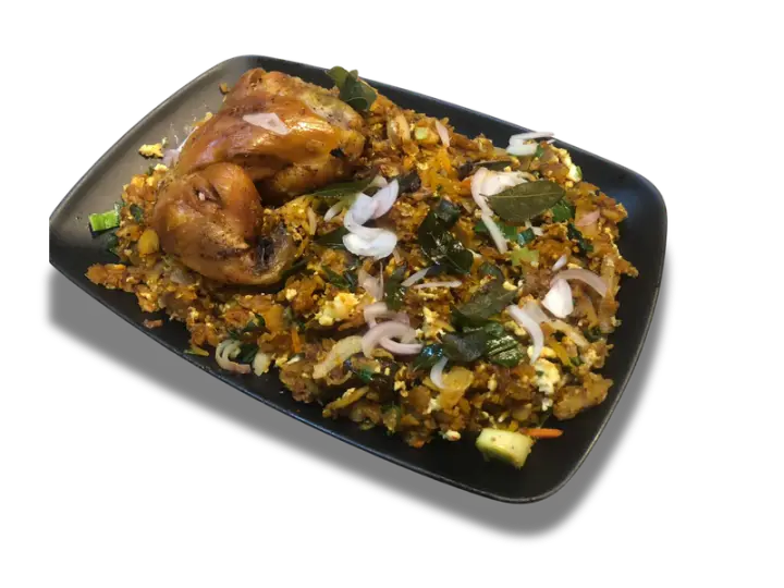 Chicken kottu served on a black platter